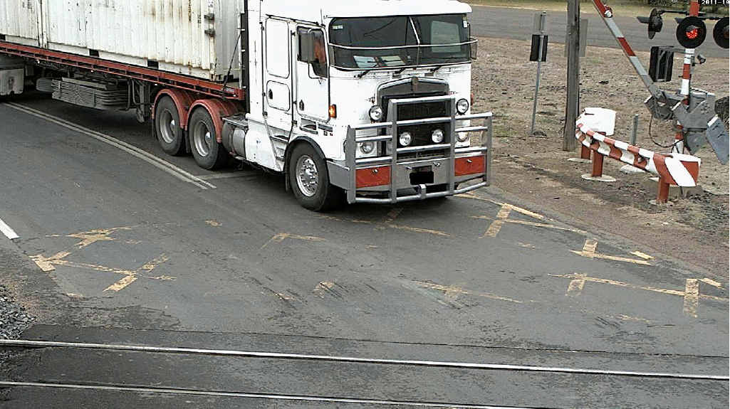 A QR train driver had to brake suddenly when this truckie decided to run the Dingo rail crossing on Wednesday. A QR train driver had to brake suddenly when this truckie decided to run the Dingo rail crossing on Wednesday.